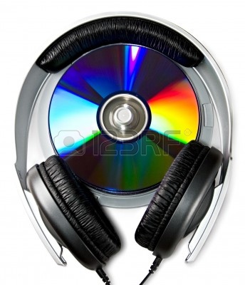 6779660-headphones-and-cd-disks-isolated-on-white.jpg