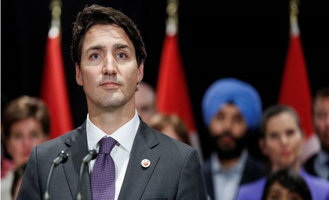Canadas-Trudeau-welcomes-refugees.jpg