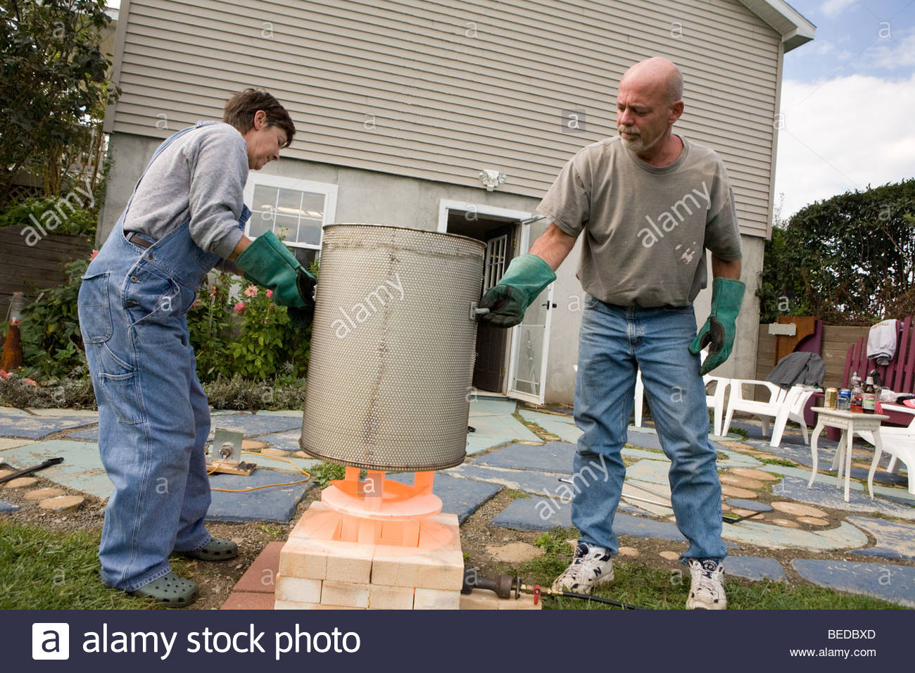 first-part-of-raku-process-is-an-outdoor-gas-kiln-firing-to-1700-degrees-BEDBXD.jpg